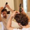Man Apply Intact 5 Pre-Shampoo to his Scalp
