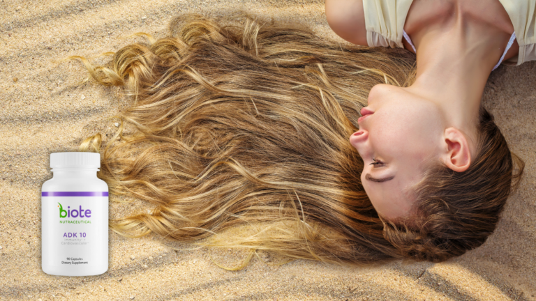 Woman with Long, Healthy Hair on Sand with Biote ADK 10 Bottle